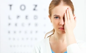 patient checking visual acuity patient checking visual acuity