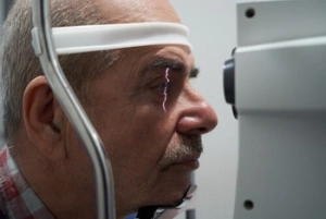 patient during eye exam patient during eye exam